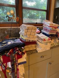 too many aprons and kitchen towels